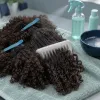 Comment brosser les cheveux bouclés et texturés sans les abîmer